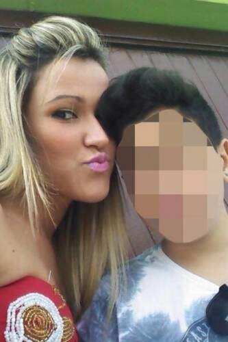 Vendedora Sara Nellye Campelo e o filho. (foto: reprodução)