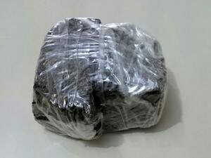 Polícia também encontrou invólucros de maconha na casa de uma cliente da mulher. (Foto: Reprodução) 