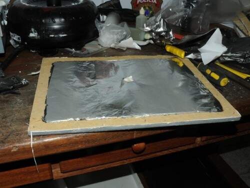 Polícia Federal prende espanhol que tentava embarcar com cocaína escondida dentro de quadros do Papa e turbina automotiva (Foto: Divulgação/DPF )