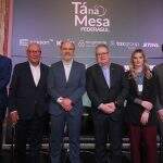 Empresários gaúchos se reúnem no evento Tá na Mesa da Federasul para discutir tarifaço dos EUA.